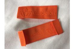 China Comfortable Needleloom Woven Clothing Labels With High Frequency Debossing supplier