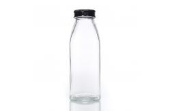China Bpa Free 25Oz 32Oz Pasterurization Juice Milk Delivery Glass Bottle With Metal Lid supplier