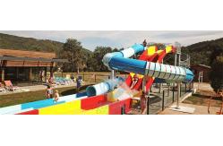 China Spiral Enclosed Water Slide Rainbow Racing Pool Slide With Led Light Effect supplier