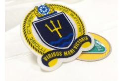 China Heat Cut Twill Fabric Custom Clothing Patches Cloth Embroidered Badges supplier
