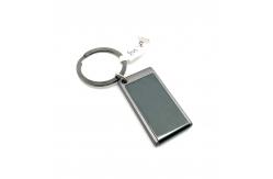 China Metal Keychain Holder Iron Keychain Container with Black Gun supplier