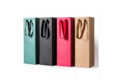China Recyclable Printed Paper Carrier Bags With Paper Twist Handle supplier