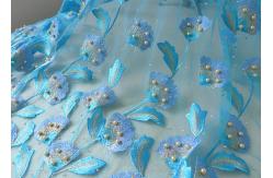 China Luxurious Embroidery Ice Blue Beaded Lace Fabric With Ginkgo Leaf Gold Pearl supplier