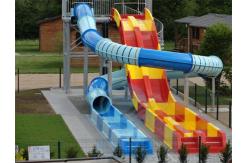 China Spiral Enclosed Water Slide Rainbow Racing Pool Slide With Led Light Effect supplier