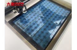 China ODM CO2 Laser PVC Film Mobile Screen Protector Cutting Machine Automatic supplier