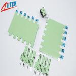 Green Compressible Thermal Conductive Pad TIF140-15-07S with Ceramic Filled Silicone Rubber 1.5 W / mK, 60shore00 for sale