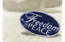 China Beautiful Oval Custom Clothing Patches Embroidered Sew On Badges Eco - Friendly supplier