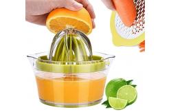 China Manual Bulk Kitchen Supplies Orange Lemon Squeezer Juicer With Measuring Cup Grater supplier