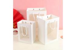 China Handmade Offset Printing Kraft Paper Gift Bags With Clear Window supplier