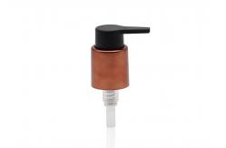 China Bronze Glossy Closure 24mm Cosmetic Treatment Pumps With Matte PP Pump Head supplier