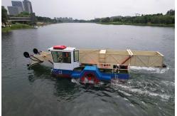 China Paddle Wheel Propulsion 5 Km/h Surface Cleaning Boat For River supplier