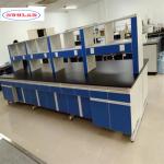 Well-Organized Chemistry Lab Bench with Drawers and Smooth Blue Surface for sale