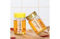 China Empty Clear Square Glass Honey Jar With Screw Plastic Lid Classic Design supplier