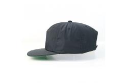 China Unstructured Plain Nylon Flat Brim Snapback Hats For Boys Custom 5 Panels supplier
