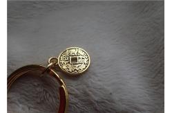China Chinese Style Ceramic Fat Baby Gold Ingot Key Chain In Red Coat supplier