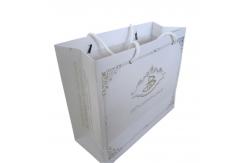 China Order Custom Printed Paper Merchandise Bag Business Packaging Online With Eyelet supplier
