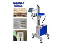 China Multilingual Fiber Laser Printing Machine for metal tin can pipe coding supplier