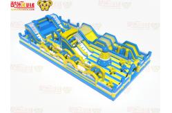 China Big Circle Obstacles With Slides Inflatable jumping playground supplier