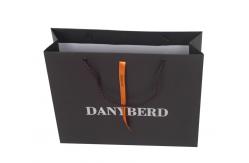 China Order Custom Printed Paper Merchandise Bag Business Packaging Online With Eyelet supplier