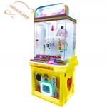 Dreamland Mini Coin Operated Cheap Amusement Gift Game Machine Children Clip Sticker Card Clamp Machine for sale