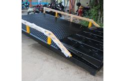 China 10T-10M Customized Black Segmented Portable Loading Docks Hydraulic Dock Ramp supplier