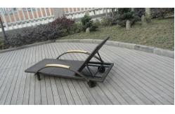 China Modern Rattan Sun Lounger , Folding Lounger With Side Tea Table supplier