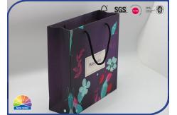 China 4C Printed Paper Packaging Special Bag Matte Lamination With Nylon Handle supplier