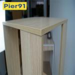 Economic Home Wooden Book Rack Three Panels Hollow Design With 4 Wheels