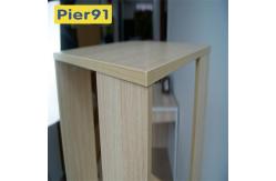 China Economic Home Wooden Book Rack Three Panels Hollow Design With 4 Wheels supplier