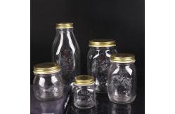 China Carved Flower Honey Glass Jar And Spoon Transparent Honey Container supplier