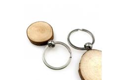 China Handcrafted Simple Round Wood Keychain Engraving Natural Eco Friendly And Rustic supplier