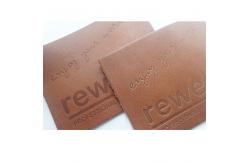 China ODM Embossed Logo Genuine Leather Patches For Clothing And Hats supplier