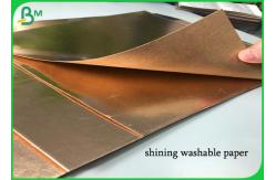 China Tear Resistant Roll 0.55mm Shining Washable Kraft Paper For Bag supplier