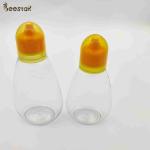 250ml 350ml 500ml Honey Jar And Spoon Plastic Empty Honey Bottles for honey storage for sale