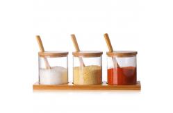 China Glass Condiment Seasoning Containers Bulk Reusable Spice Jars With Wooden Lid Spoon supplier
