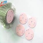pink Silicone High Insulating Heat Sink Thermal Conductive Pads with Adhesive Coating 1.5 W/mK for sale