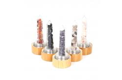 China Round Glass Water Bottle With Natural Crystal Gemstone Center Elixir Crystal Point supplier