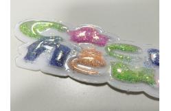 China Sustainable Custom Sparkling Pink Yellow TPU Patch Puffy Labels Customized For Clothing supplier