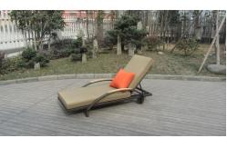 China Modern Rattan Sun Lounger , Folding Lounger With Side Tea Table supplier