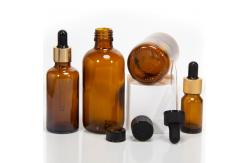 China Empty Amber 2oz Dropper Bottles Tincture For Essential Oil supplier