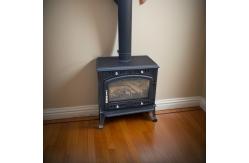 China Manual Ignition Portable Wood Fire Pit Cast Iron Small Stove supplier