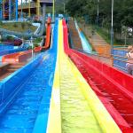 Multi Lane Racing Water Slide For Aqua Water Park With Rainbow Colors for sale