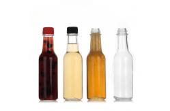 China 100Ml 150Ml Round Shape Tomato Hot Sauce Glass Soy Sauce Bottle supplier