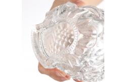 China Unique Buddha Head Shaped Glass Bottles with Aluminum Plastic PP Collar Material supplier