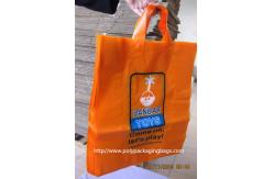 China Orange Plastic Clothes Packaging Soft Loop Handle Bag in HDPE LDPE supplier