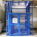 20000kgs Industrial Goods Lift Blue Vertical Cargo Lift With Guide Rails