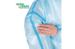 China Blue/White Waterproof Disposable PP PE Medical Isolation Gown With Blue Tape supplier