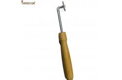 China Beekeeper Beehive Tools Wooden Handle Spur Embedder With Small Gear For Beekeeping supplier