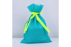 China Waterproof Non-Woven Drawstring Gift Bags 34x42cm Customizable supplier