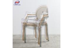 China Colorful Stackable Louis Lear Plastic Ghost Chair Resin Chiavari Chair With Armrest 300kg supplier
